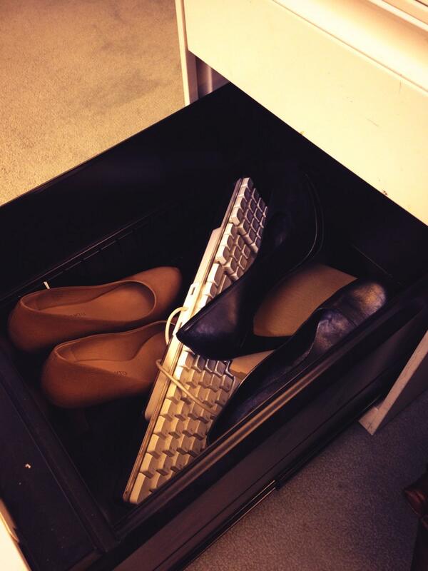 LaidOff's tweet photo. Day 4 on the #job + the desk drawer #shoe collection has already begun. No clue where the bathroom is though. #newbie http://t.co/Qdzje5vbkJ
