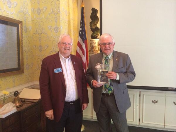DG Luther Moore presenting Bruce Kantor Charlotte with West Rotary Club's Rotarian of the Year award. Congrats Brice!