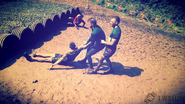 TWStills's tweet photo. A #photo about teamwork - taken at a #ToughMudder event in #London - a fitness challenge for body and mind. Happy #FF http://t.co/lLRxmUdQou