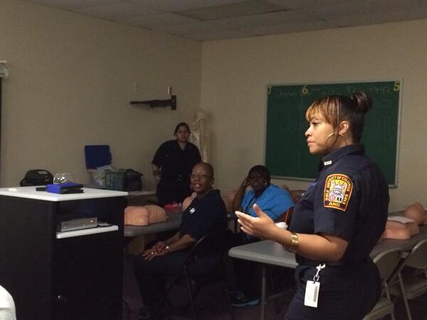 dcfireems's tweet photo. #EMSWEEK2014 continues... EMT Donnita Jackon teaching #CPR to members of the community at PR Harris School http://t.co/W2fzPnw2FV