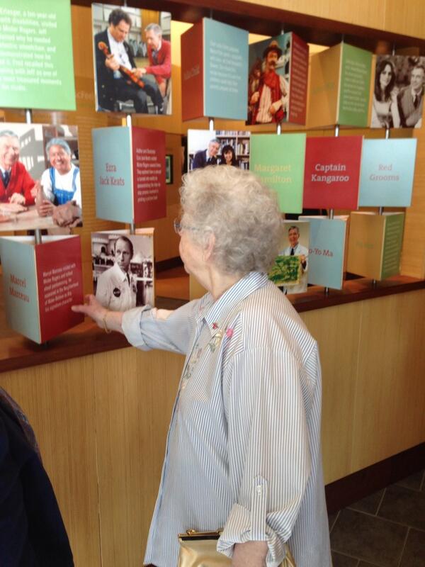 Joanne Rogers, Fred Rogers' widow, views the @FredRogersCtr exhibit. #FredRogersLegacy