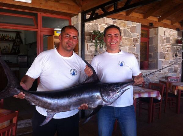 Two handsome guys....one fresh swordfish!! #kos2014 #kardamena