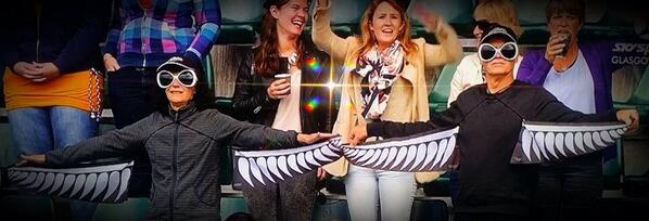 Shea_McAleese's tweet photo. The best ever @BlackSticks fans! Silver fern wings so cool! Stand out from the crowd! #RHWC2014 #CelebrateHockey http://t.co/v5qGxJCI4o