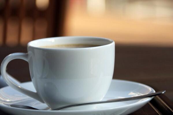 Do a cup of coffee. Кофе. Чашка кофе. Чашка кофе сбоку. Кофе в белой чашке.