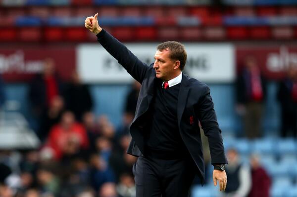 BBCSport's tweet image. .@LFC manager Brendan Rodgers signs new long-term contract at Anfield bbc.in/SFbOII