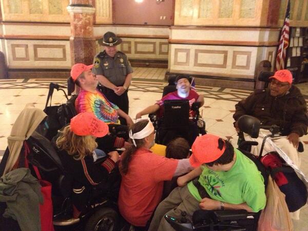 SEIUhciimk's tweet photo. What COURAGE looks like: advocates for home care services get arrested w/ @AccessLiving @ADAPTChicago  #twill http://t.co/D8vtVBNANy
