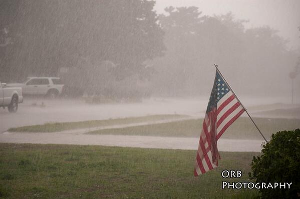 ttu_red's tweet image. Third time it has rained in Lubbock today! Neighbor didn't get his flag taken down in time. #txwx #lubwx #drenched