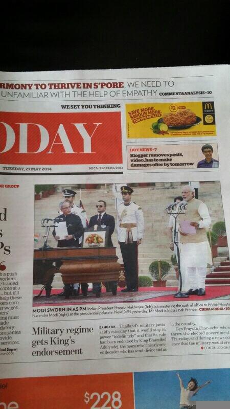 SushantBSinha's tweet photo. Oath Ceremony of @narendramodi  on front page of Singapore papers. 
#Modiheadsto7RCR http://t.co/rhTYqWFn0v