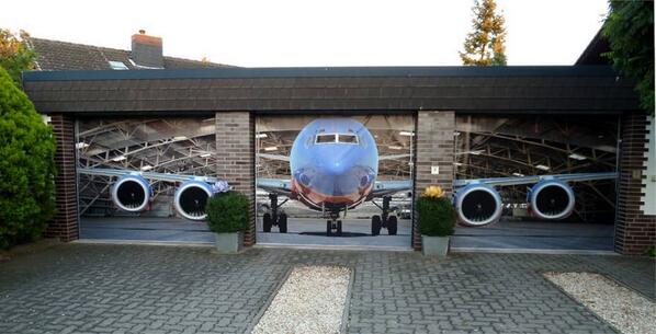 TheMindBlowing's tweet photo. This is the coolest garage door, you'll ever see. http://t.co/TyfzIKxQcR