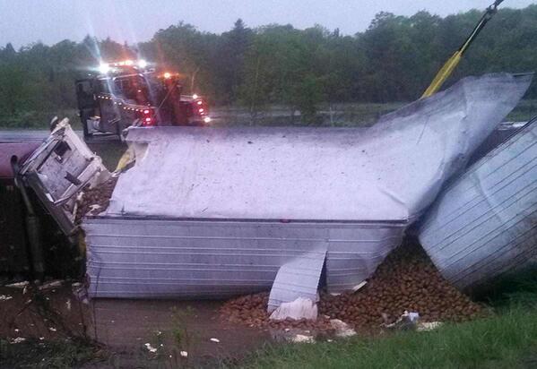 PressHerald's tweet image. Only in Maine? Truck swerves to avoid a moose and spills its load of potatoes. bit.ly/1lQM5nR