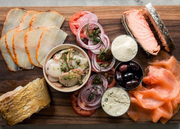 nytcooking's tweet image. A spread of "appetizing" smoked fish at the new Russ &amp;amp; Daughters Cafe: nyti.ms/1jtqSid Photo: Sasha Maslov