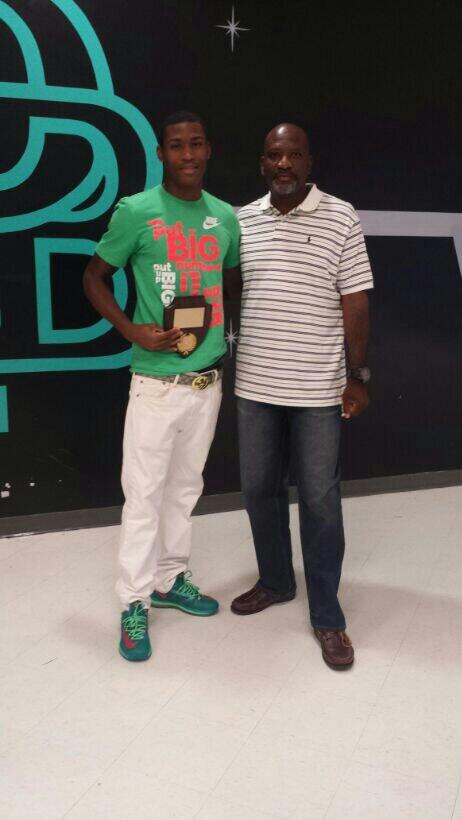 SpeedySims's tweet photo. Me and best mentor. Coach wallace. 
"Coach of the year " http://t.co/nNpEAP5Dat