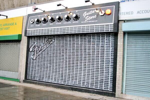 simonsugar's tweet image. Great Shop front #advertising for a guitar store #retail