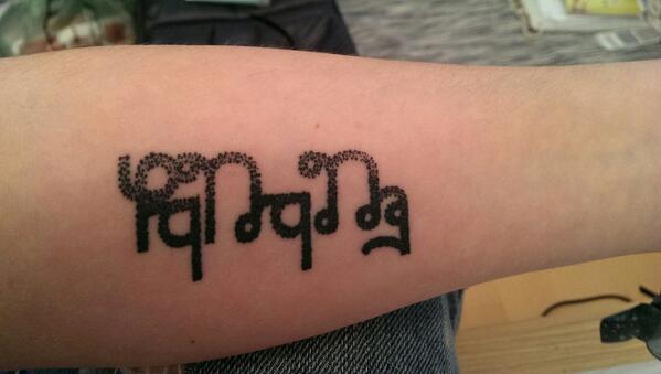 <a href="/kevinmurphyhc/">Kevin Murphy</a> with some translation help from <a href="/Dedalvs/">David J. Peterson</a>. This is on my left arm.