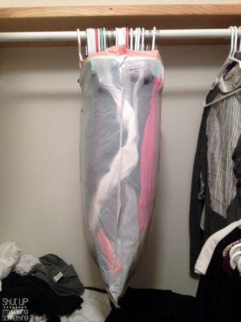 Keep your hanging clothes protected with a simple garbage bag when moving them. Credit: bit.ly/1s6yLEw