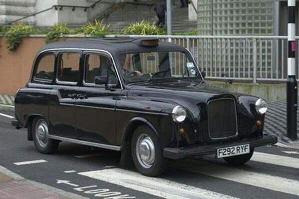 Mattisamazing33's tweet photo. The new Bentley SUV has been captured in disguise. Funny thing is, it looks like a black cab http://t.co/l6cjgRWhng