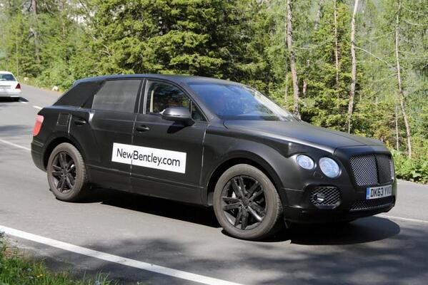 Mattisamazing33's tweet photo. The new Bentley SUV has been captured in disguise. Funny thing is, it looks like a black cab http://t.co/l6cjgRWhng