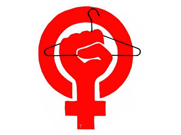 DuBigWiggle's tweet photo. @Clutch_43 is it me or is this photo encouraging people to punch a vagina with a hanger? http://t.co/t7Ox3uw2eX
