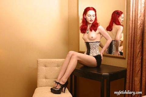 first shoot i did w/ Christine Kessler in 2001 in a Dallas hotel room. all i have left of it is this low res shot. http://t.co/1evzMIMuxn