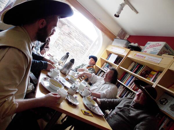 Turning back time for lunch time. Muskets down, a group of men from the Siege days enjoy lunch at <a href="/CafeBlooms/">Cafe Blooms</a> today