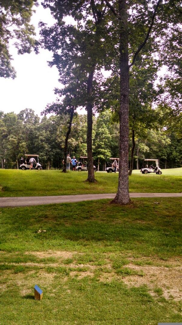 Frogg Toggs photo shoot while verticutting and topdressing. #neveradullmoment