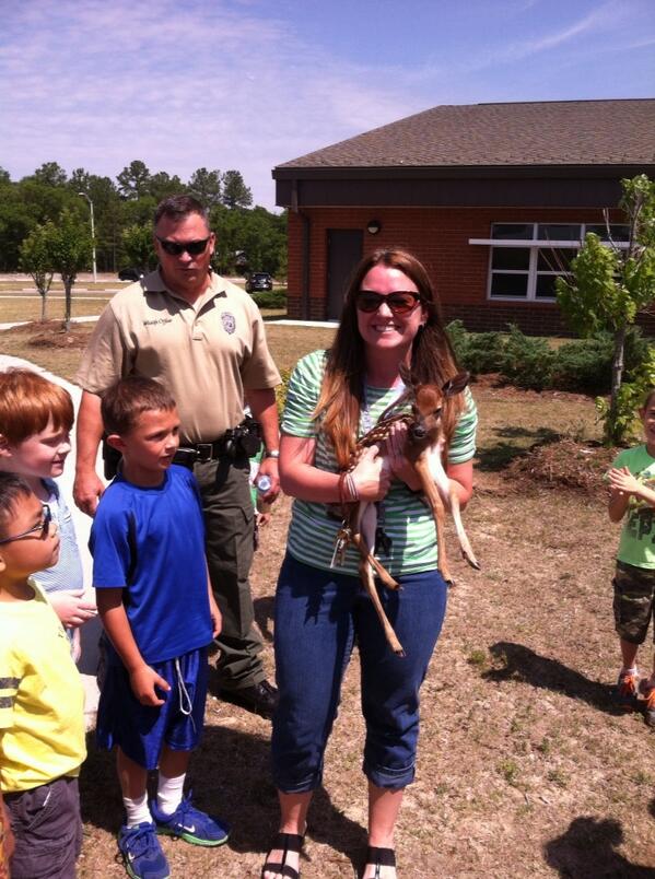 CastelliSharon's tweet photo. Ms Diveley and her new pet. Thank you NC wildlife commission. http://t.co/O9XmDxOW8W