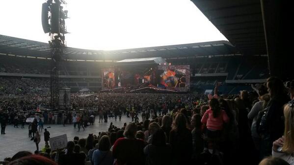 Perhaps shades would have been more appropriate than my new rain coat! Beautiful evening at #onedirectionedinburgh