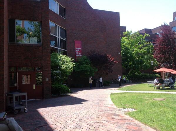 Great Weather at present in Boston The banner on the wall of the building we are using gives just the right message
