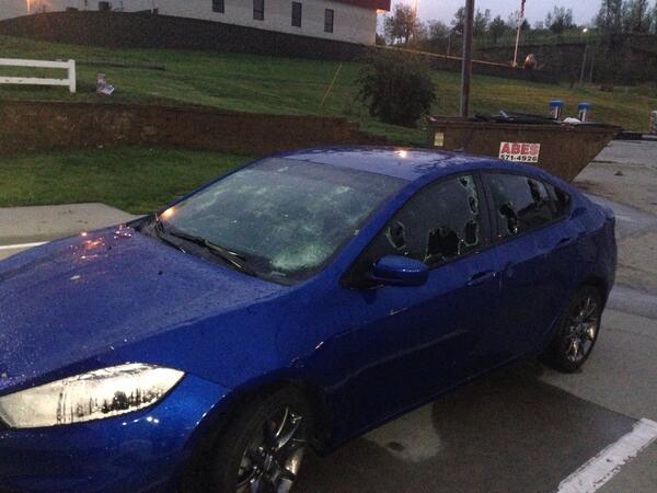 IndraPetersons's tweet photo. Went on a coffee run. Cars look like this all over town from grapefruit size hail http://t.co/0JmbVEZE2B