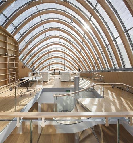 dezeen's tweet photo. Interior shot of Renzo Piano's almost-complete Pathé Foundation: http://t.co/FnACPNwtGO #architecture http://t.co/7dh87Ers0u