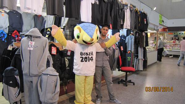 World Cup Brazilian Mascot ''armadillo' Meeting St Johns Market Traders today in LIVERPOOL..