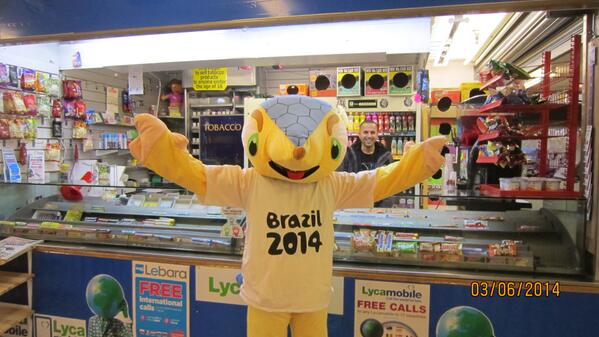 World Cup Brazilian Mascot ''armadillo' Meeting St Johns Market Traders today in LIVERPOOL.......