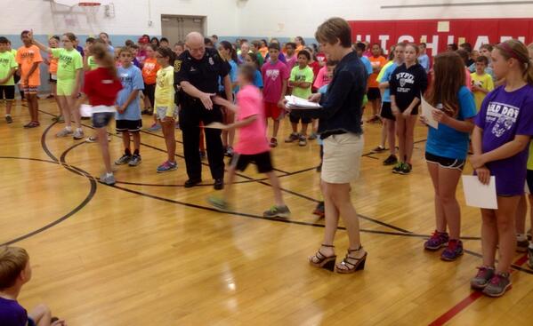 HighlandIndians's tweet photo. Safety Patrol advisor @jbhildebrandt &amp; Officer Hendricks recognize 5th graders for their #service to Highland http://t.co/bHd6quLozm