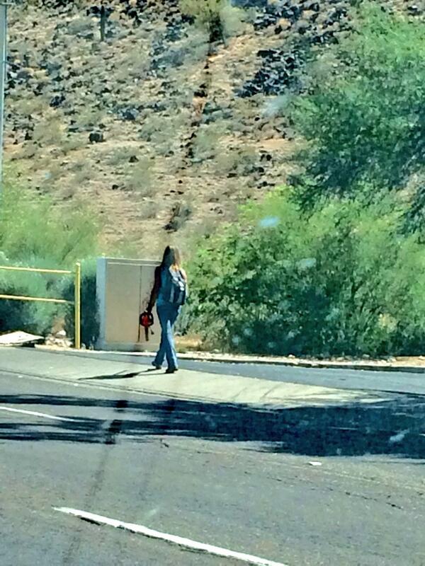 Literally a woman walking down the street with a chainsaw in hand. #onlyinarizona