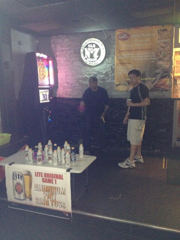 LexiO's tweet photo. Get down to garage door for some ring toss for a chance to win DNA headphones!! @M2Third #MillerLite http://t.co/RpJwQIb128