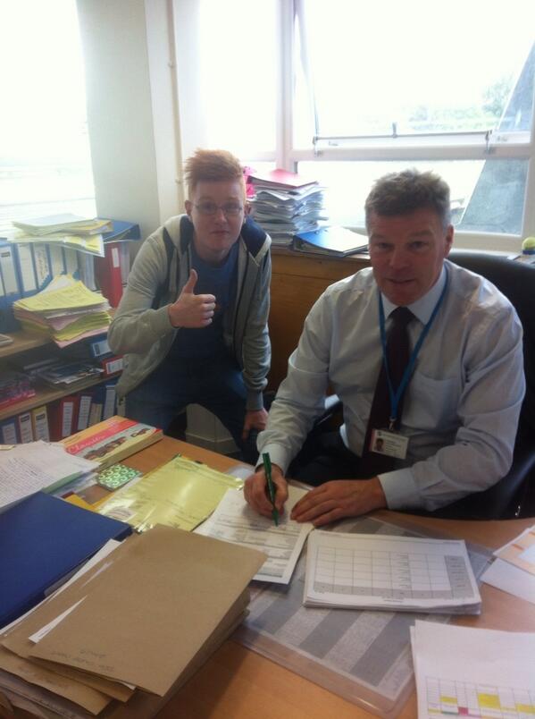 Fighting back the tears as I sign Jack's leavers form.