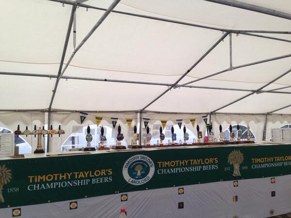 Travsrest's tweet photo. Bar is on! Stay dry under the marque! @3Valleysfest @DronfieldCAMRA http://t.co/JfWaj00iIB