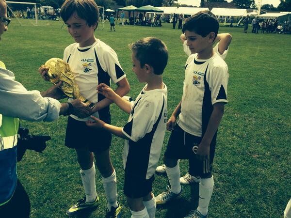 AMSoccerSchool's tweet photo. U9's posing with the 'real'World Cup trophy!?? http://t.co/xXgexiw4ft