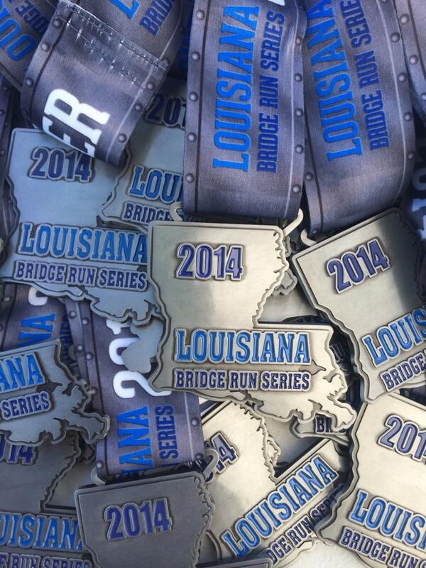 MikeontheMicTV's tweet photo. #LouisianaBridgeRunSeries medals are waiting! @HueyPBridgeRun @CCC10k @bakramer1 @NOLArunner1 http://t.co/ps5OVYEazX