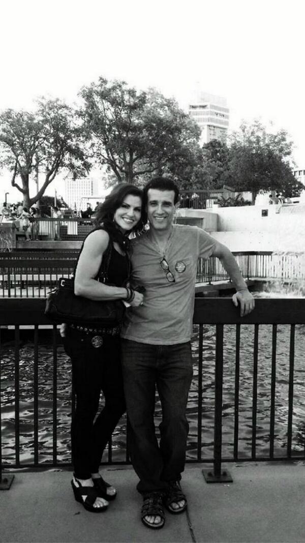 WizardofOZ71's tweet photo. My one n only beautiful sister and her husband! :)  Yea she works out! look at those biceps! Lol http://t.co/sbZkkxvSiq