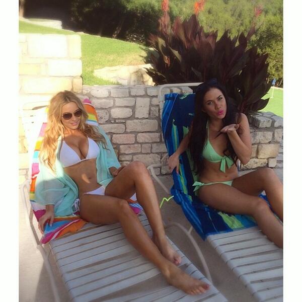 HeymanHustle's tweet photo. #HustleBootyTempTats Super Model of the Year @EllieGonsalves and @RaniKrause soak up the sun by the pool! #AussieHot http://t.co/9J5NOTKPav