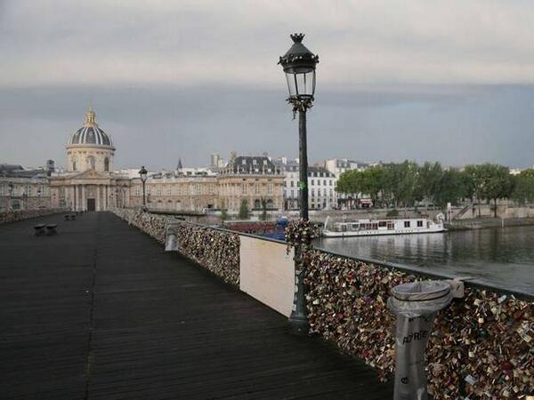 Independent's tweet photo. Part of Paris bridge collapses under weight of 'love locks' left by tourists
http://t.co/MU0Ir1JGkH http://t.co/qxZOmSfENB