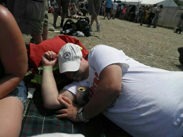 I have the ultimate #GlastoGizmos My royal mail bag, carries all my beer and works as a handy pillow when needed!