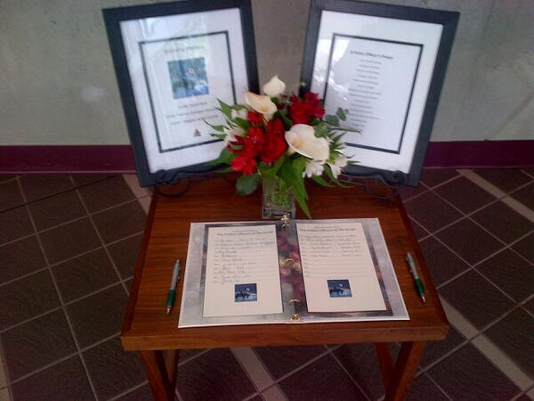 SaanichPolice's tweet photo. Please visit our front foyer at HQ to sign the book of condolences for the families of  @RCMPNB #Moncton officers. http://t.co/xnEJlVK04W