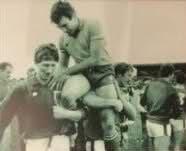 Roscommon great Dermot Earley carried shoulder high off the pitch by Mayo players after his last game.