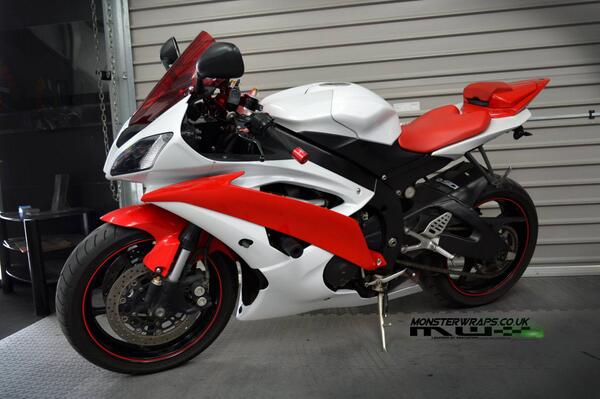 ArlonGraphics's tweet photo. What's red, white, and black all over? This awesome Yamaha bike by @monsterwraps. Excellent use of our #WhiteMetallic http://t.co/CR6QxygUXf