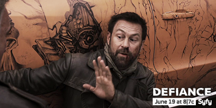 DefianceWorld's tweet photo. Nolan is beaten and cuffed to the side of Varus' roller. #DefianceScript http://t.co/rPkCPawl0s http://t.co/wNoNWnY8y7