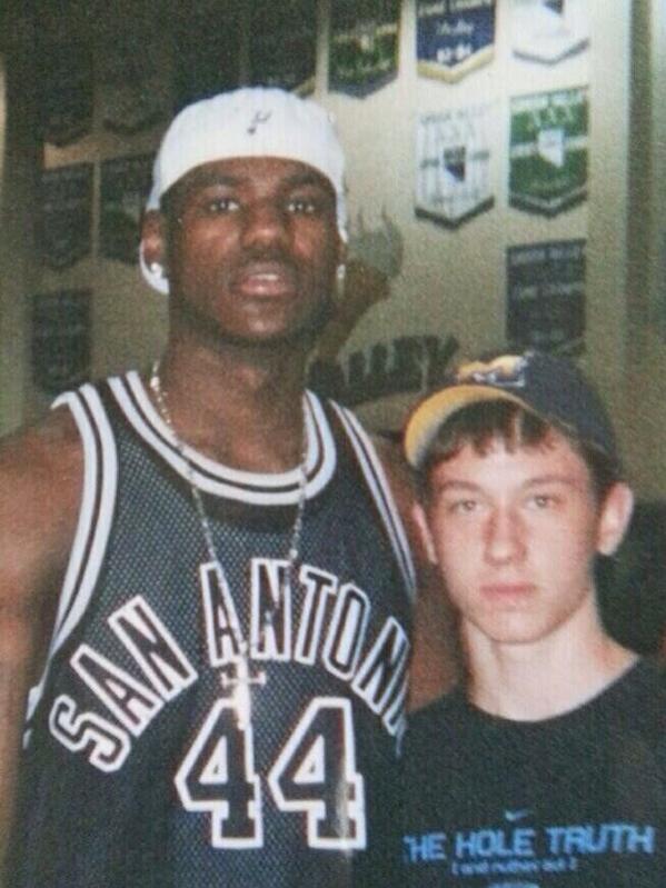 A young LeBron James wearing a Spurs 