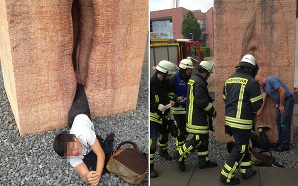 American student rescued from giant vagina sculpture in Germany Bq0pOOPIUAAlPoG