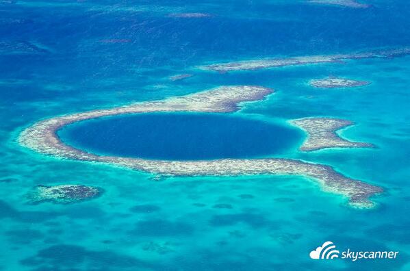 Skyscanner's tweet photo. The Great Blue Hole in Belize and 10 other natural wonders http://t.co/rgq8gCmHur #explore http://t.co/9vW2vdDxwd